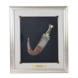 Jambiya knife, with brass detail on the horn handle, within leather and silvered scabbard,...