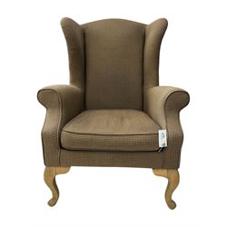 Hardwood-framed wingback armchair, upholstered in dog tooth pattern fabric, on cabriole supports 