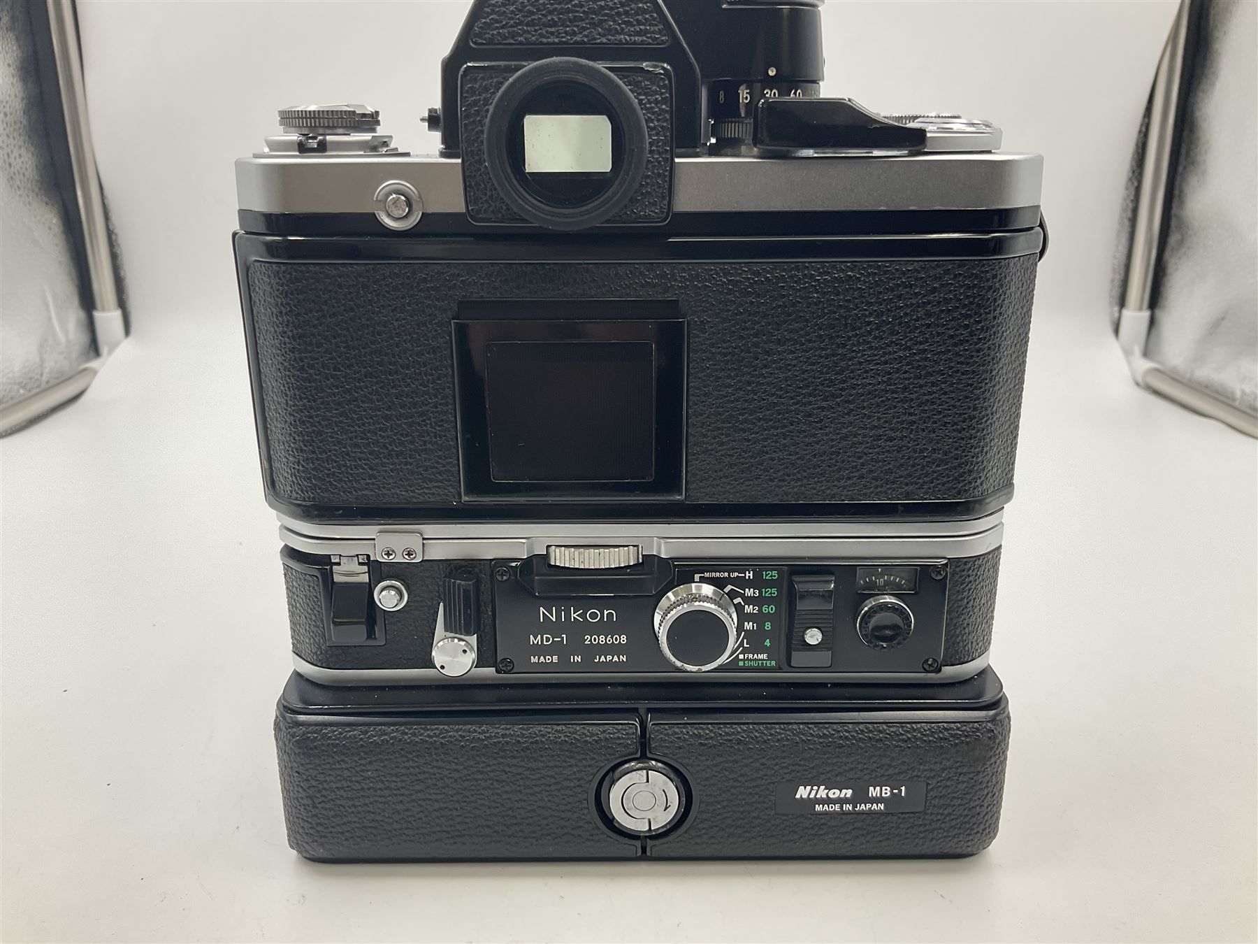 Nikon F2A Photomic camera body, serial no. 7844439, with 'Nikon Zoom-NIKKOR 35-70mm 1:3.5-4.8' lens, serial no. 5352031, Nikon MD1 Motor Drive, serial no. 208608 and Nikon MB1 battery pack