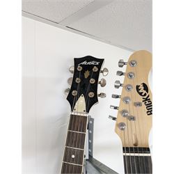 Rock Jam six string electric guitar, together with a Rock Jam amplifier and an Atrics guitar