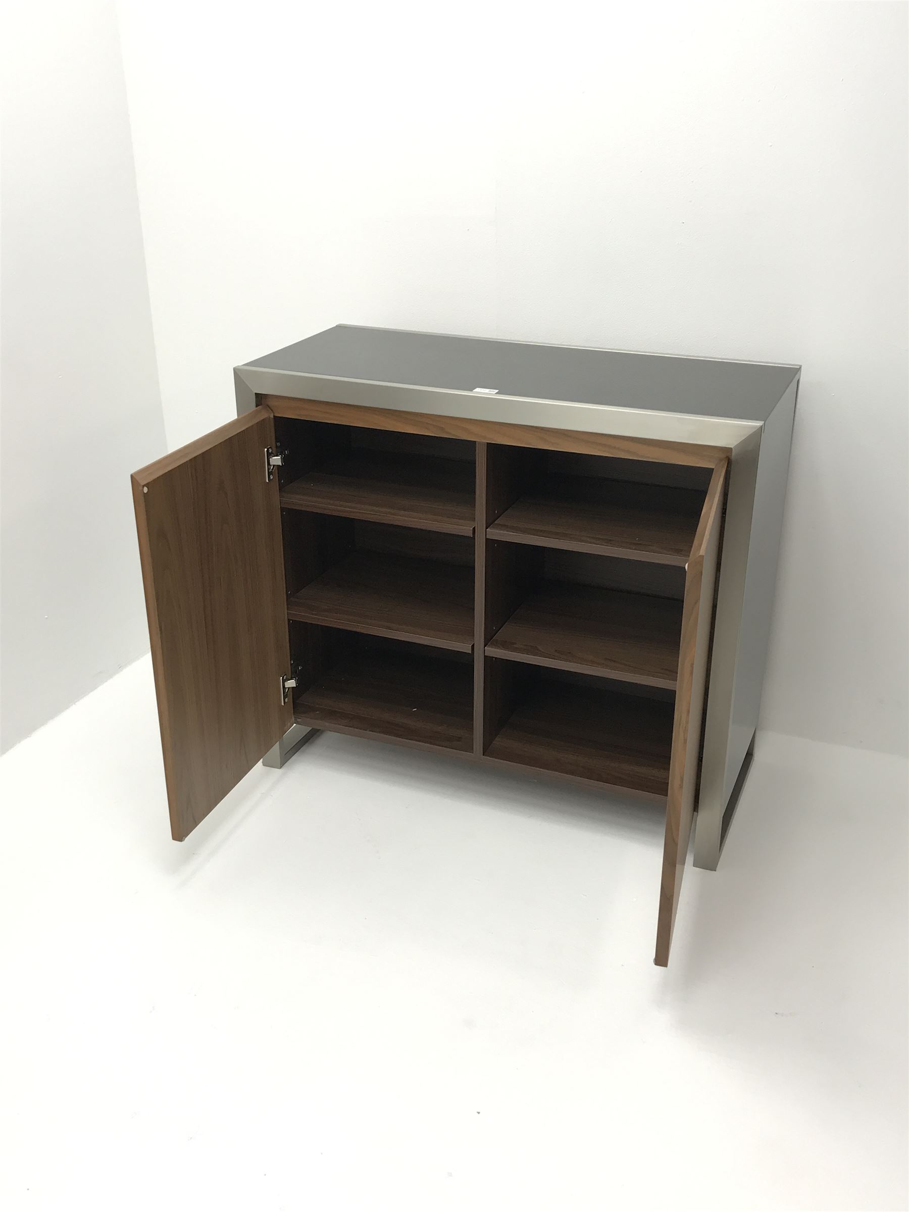 Dwell Furniture Nova walnut and black gloss cabinet, two doors enclosing four adjustable shelves cabinet, brushed steel frame supports