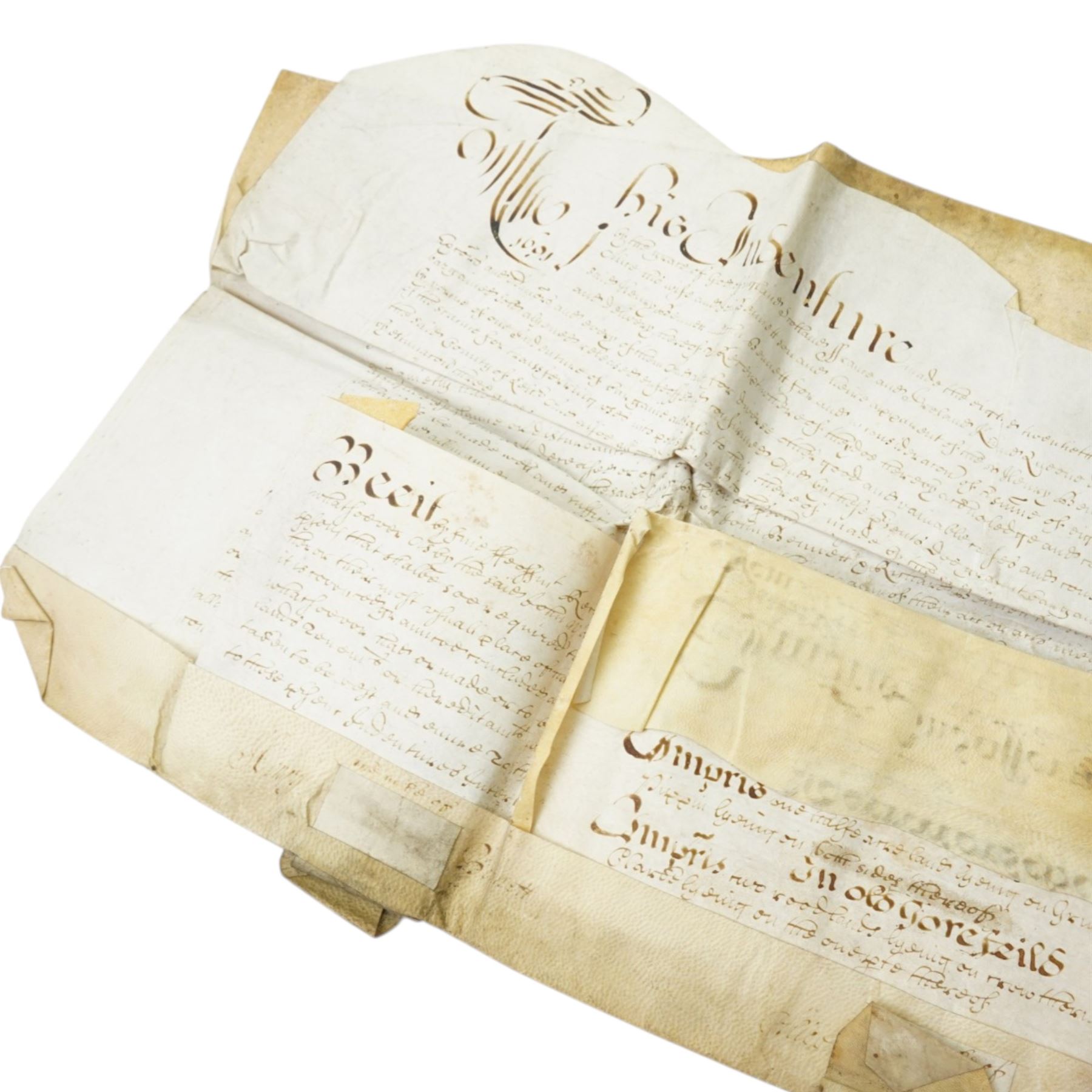 George III surrender of a tenancy in the Manor of Liddington in the county of Rutland, surrender of a tenancy on the same estate 1799 and two other indentures concerning the same estate; William and Mary indenture 1691,  Queen Anne indenture between John Waldrom of Oadby and George Durnor, mortgage document and other indentures