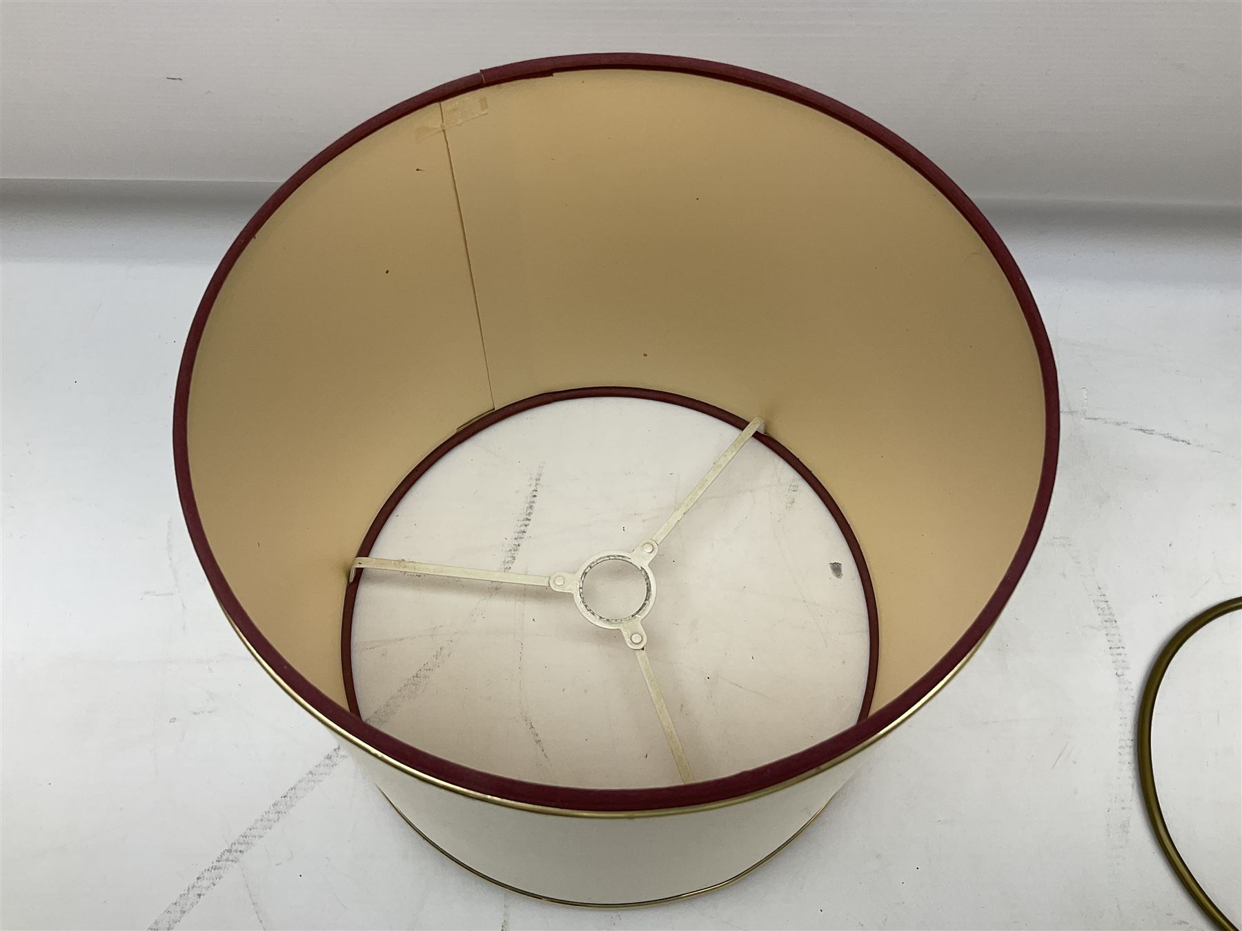 Poole Pottery table lamp in Volcano pattern of cylindrical form, with a cream lampshade, lamp H30cm