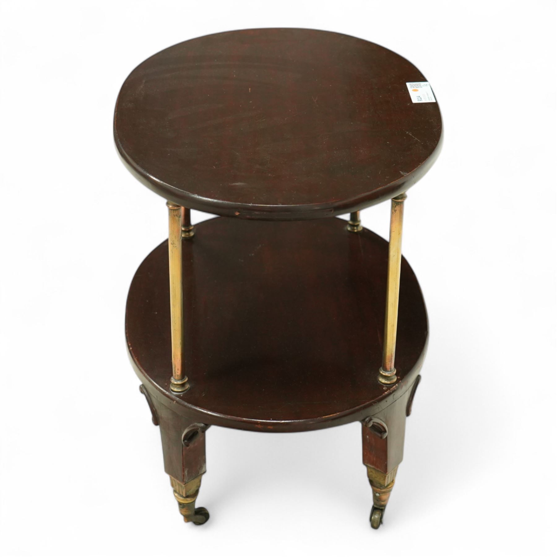 Late Victorian mahogany and brass tea trolley, square supports with C-scroll brackets, on brass cups and castors