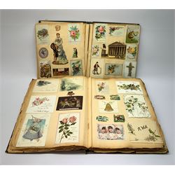 Victorian scrap album compiled by Herbert Duckitt, dated 1899, fully stocked with greeting cards and scraps of Christmas and other figures, animals, flowers, birds etc; together with another smaller scrap album (2)