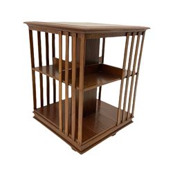Early 20th century inlaid mahogany revolving bookcase