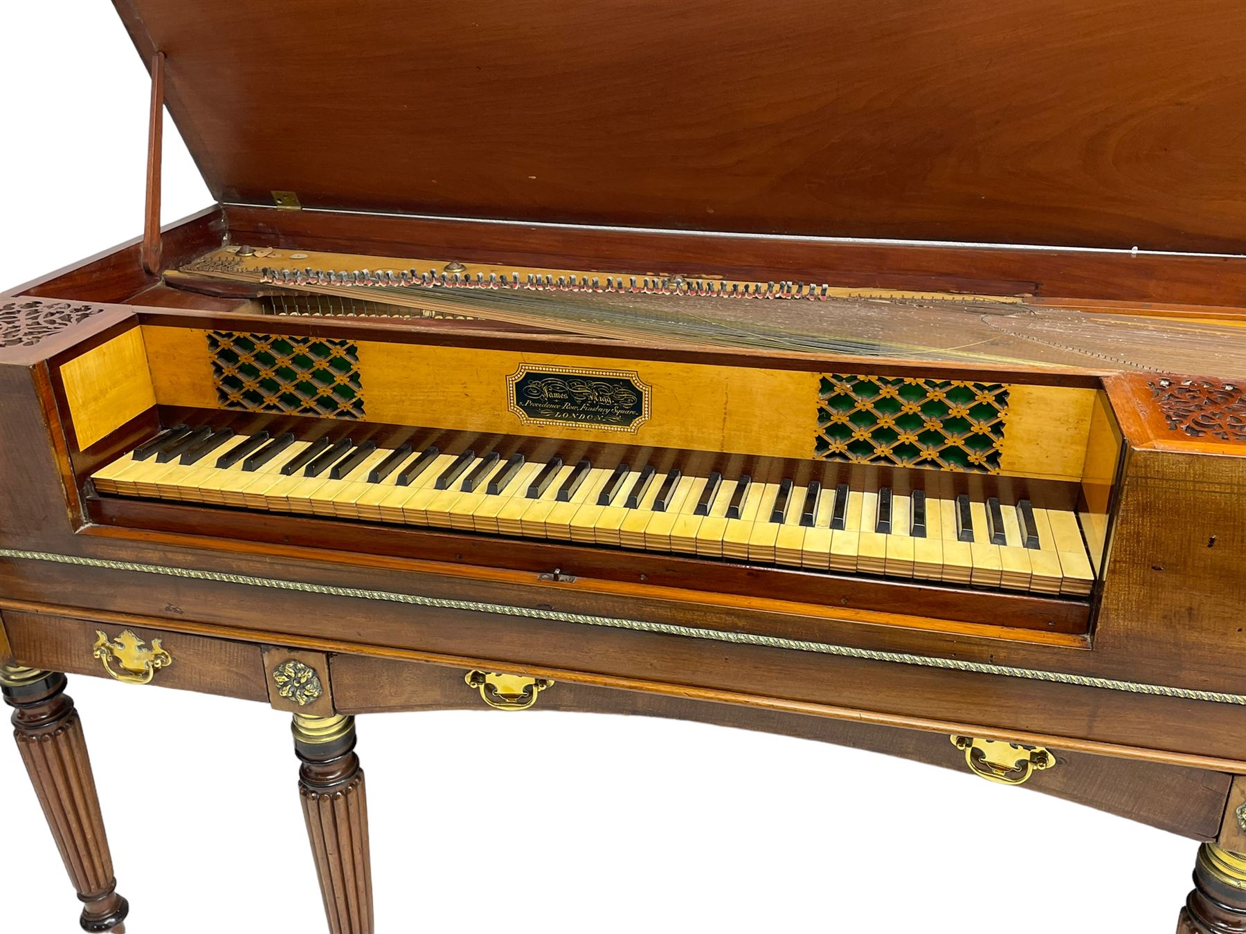 James Rigg, London -early 19th century mahogany and maple square piano c1817, with a 68 key compass (A-C) original hammers, jacks and felt, satinwood interior with ebony and ivory keys, the fretwork interior back inscribed 'James Rigg, 3 Providence Row, Finsbury Square, London', decorated with twist gilt metal edging, fitted with three drawers, on Gillows design turned and reeded supports with brass cups and castors.

This item has been registered for sale under Section 10 of the APHA Ivory Act