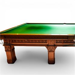 An outstanding bespoke late Victorian Aesthetic Movement golden oak full-sized snooker table of gothic influence, the rectangular slate bed covered in green baize within moulded rails and rounded pocket mounts, the protruding frame decorated with blind-fretwork frieze panels of Vitruvian scrolls and geometric ornament, over rails of repeating roundel carvings, raised on square chamfered and reeded supports with carved detail and panelled reserves, with further stylised brackets, stamped to the underside on all four edges R Anderson, serial number 4337
Viewing in situ near Tadcaster, please contact Chloe to arrange - 01904 393300