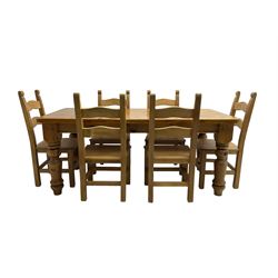 Traditional pine dining table, rectangular top with rounded corners, raised on turned supports (W83cm D90cm H77cm); and set six light oak dining chairs, waived ladder back over panelled seat (W48cm H100cm)