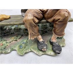 Two Capodimonte figures, comprising The Watchmaker by Curiase and Tramp Seated on a Bench, created by D.Bonalberti, tallest example H24cm