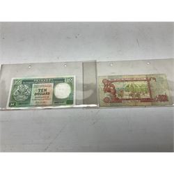 Banknotes, including Government of Gibraltar one pound 20th November 1971 'H220845', The Central Bank of Ireland one pound 30.9.76 '43L337212' etc