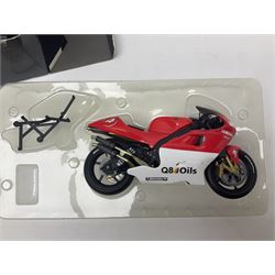 Three Minichamps 1:12 scale die-cast motorcycles - Yamaha YZR 500 Max Biaggi 2000; Yamaha YZR-M1 Colin Edwards Fiat Yamaha Team MotoGP 2007 GP Australia; and Yamaha YZR 500Team Yamaha Max Biaggi 500ccGP 2001; all boxed (3)