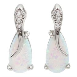 Pair of silver pear shaped opal and cubic zirconia stud earrings, stamped 925 