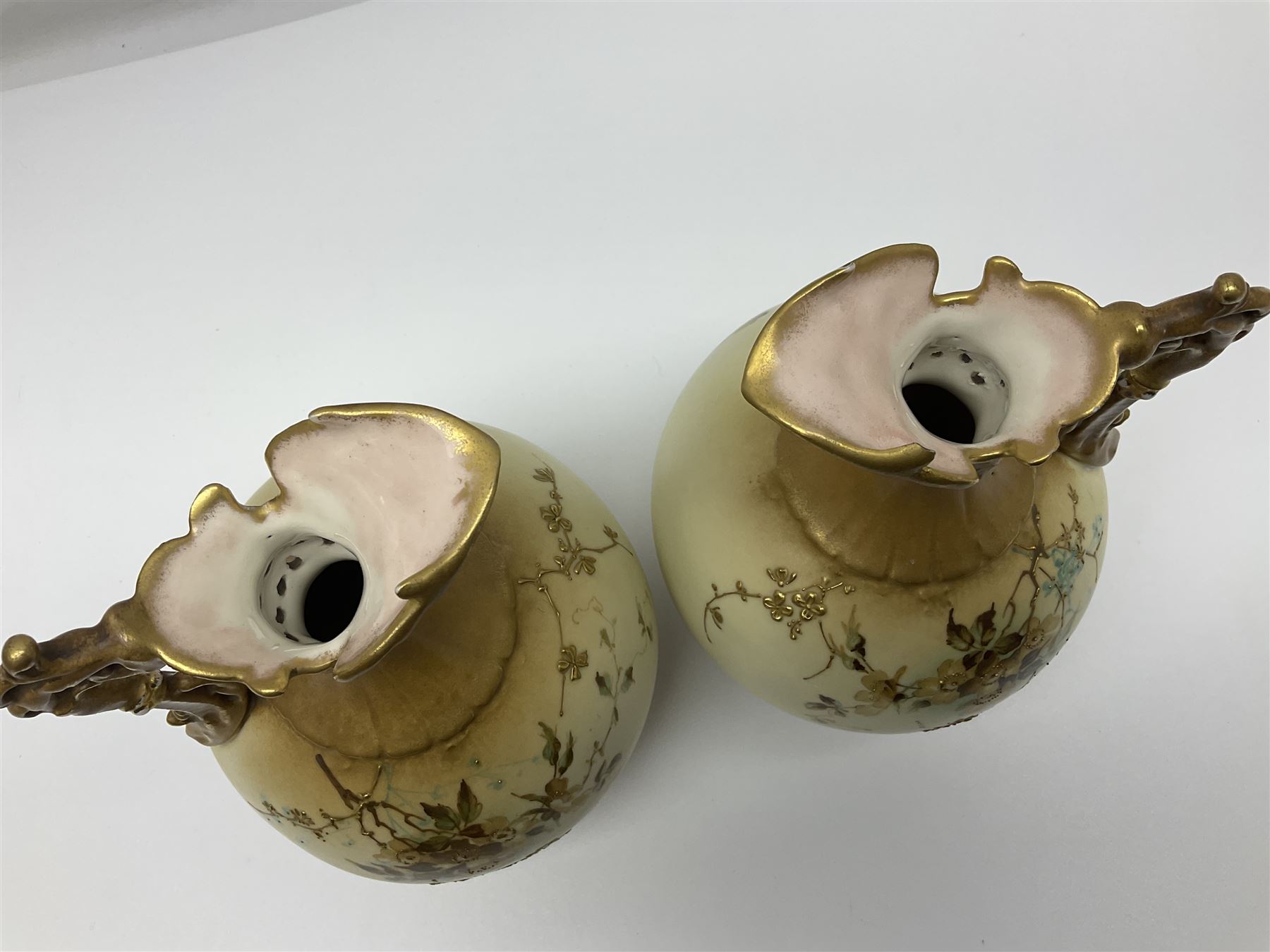 Pair of Turn Vienna blush ivory ewers decorated with floral sprays and gilt, H25cm