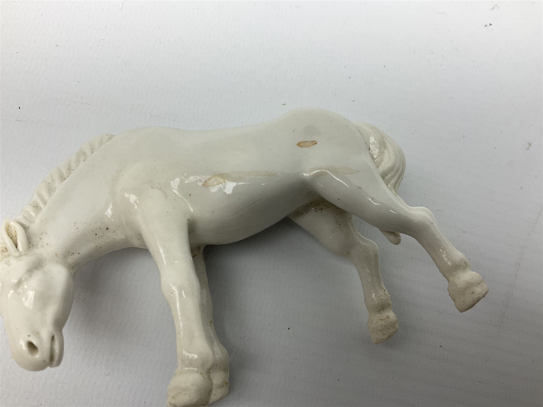 Portmeirion Malachite pattern jar and cover designed by Susan Williams-Ellis, together with a eight Viennese white glazed porcelain figures, modelled as horses in various poses, in one box 