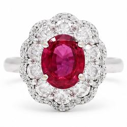 18ct white gold unheated oval ruby and round brilliant cut diamond cluster ring, hallmarke...