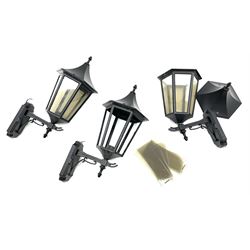 Pair black finish metal wall hanging outdoor lanterns, faceted tops with finial, and an additional lantern for spares/parts 