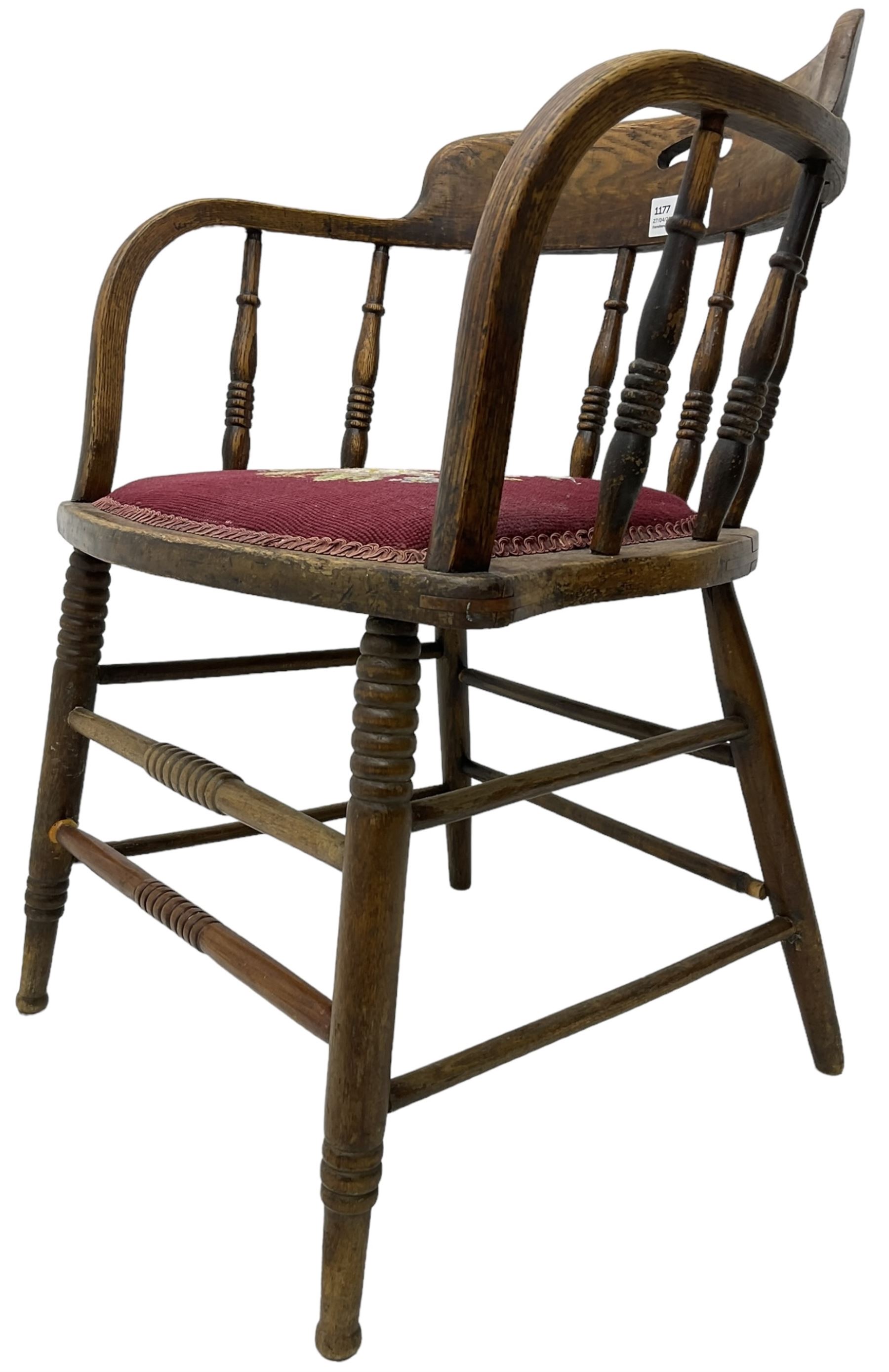 Early 20th century American oak smokers bow tub armchair, shaped cresting rail with pierced handle over ring turned spindle back, seat upholstered in pink tapestry fabric (W56cm, H73cm); small 20th century walnut occasional table on turned supports (W43cm, H70cm, D33cm)