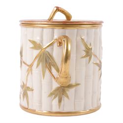 Royal Worcester Blush Ivory twin handled biscuit barrel and lid, in the form of bamboo with gilt highlights, H19cm 