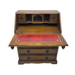 Old Charm oak bureau, fitted with fall front above four drawers