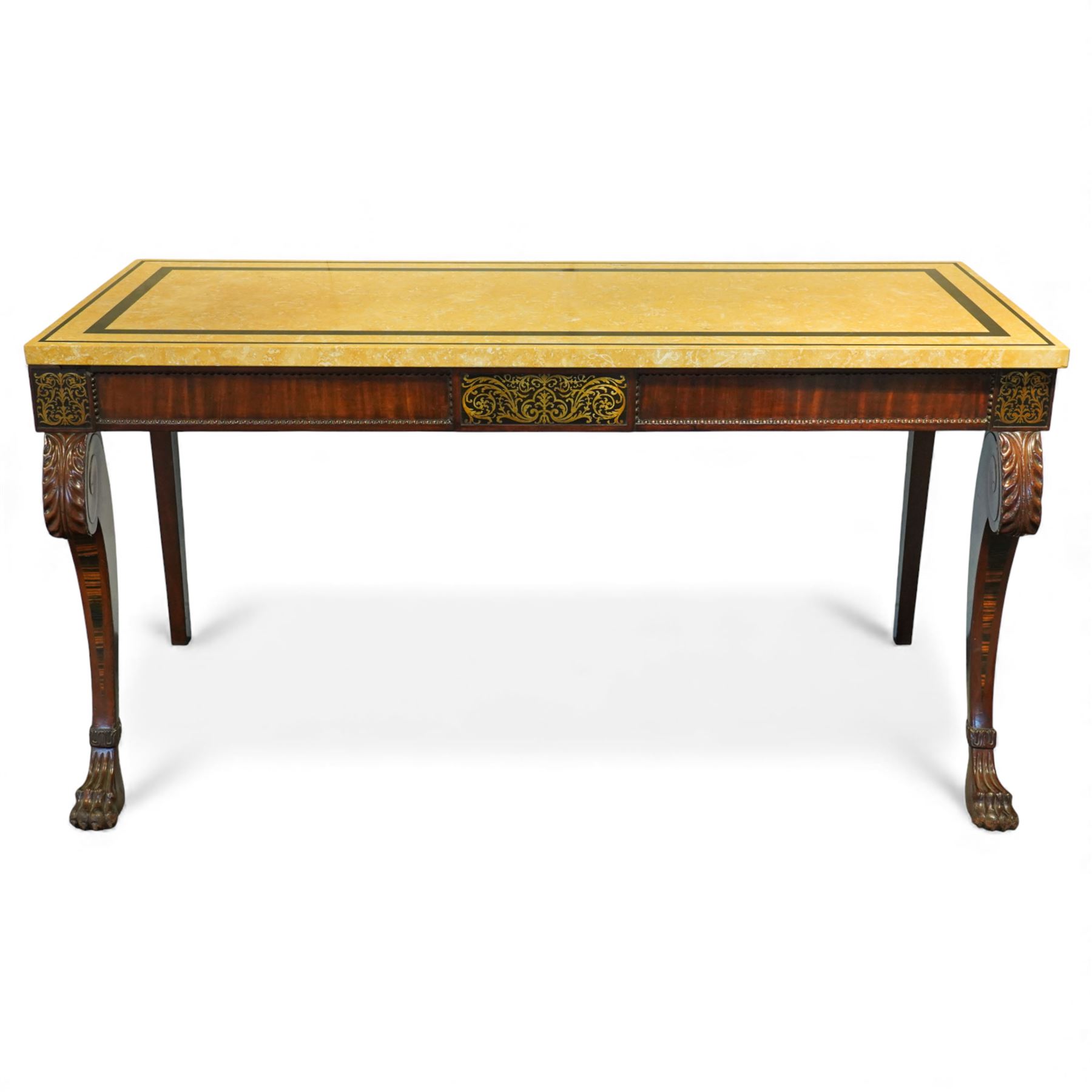 William IV mahogany and brass-inlaid marble serving table, the rectangular marble top featuring yellow tones, bordered by inlaid coloured marble bands in red and black, the frieze with brass-inlaid Boulle-inspired foliate panels on ebony, lower edge with beaded moulding, front legs inlaid with a stripped band of coromandel above carved acanthus leaves, tapering to carved lion paw feet, circa 1830