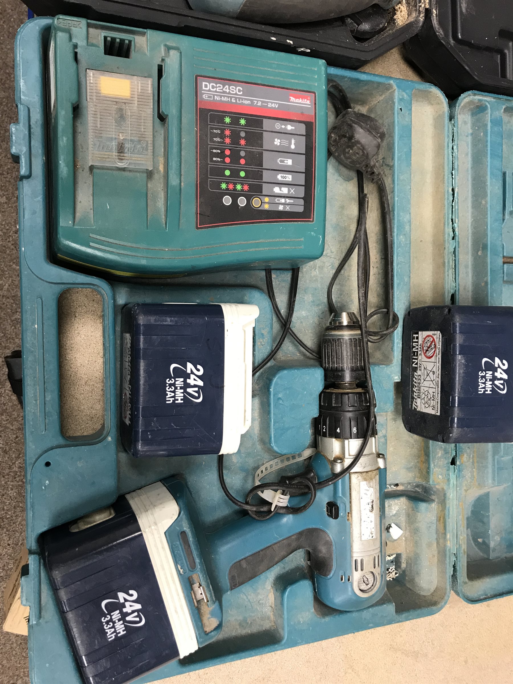 A quantity of hand tools including a Ferm FAG-230 angle grinder, a MacAllister reciprocating saw, a jig saw etc