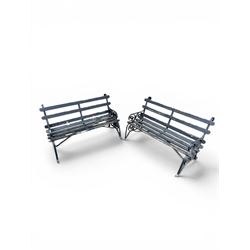 Coalbrookdale - rare pair of wrought iron and slatted wood garden benches, the twin wrought iron strapwork bench-ends formed of four scrolls over splayed feet, number 77 in the Coalbrookdale Castings Catalogue (see illustration)