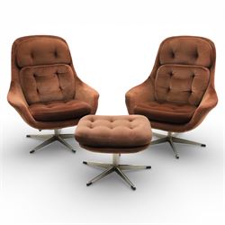 Pair of mid 20th century brown velvet swivel lounge chairs and matching footstool, the sha...