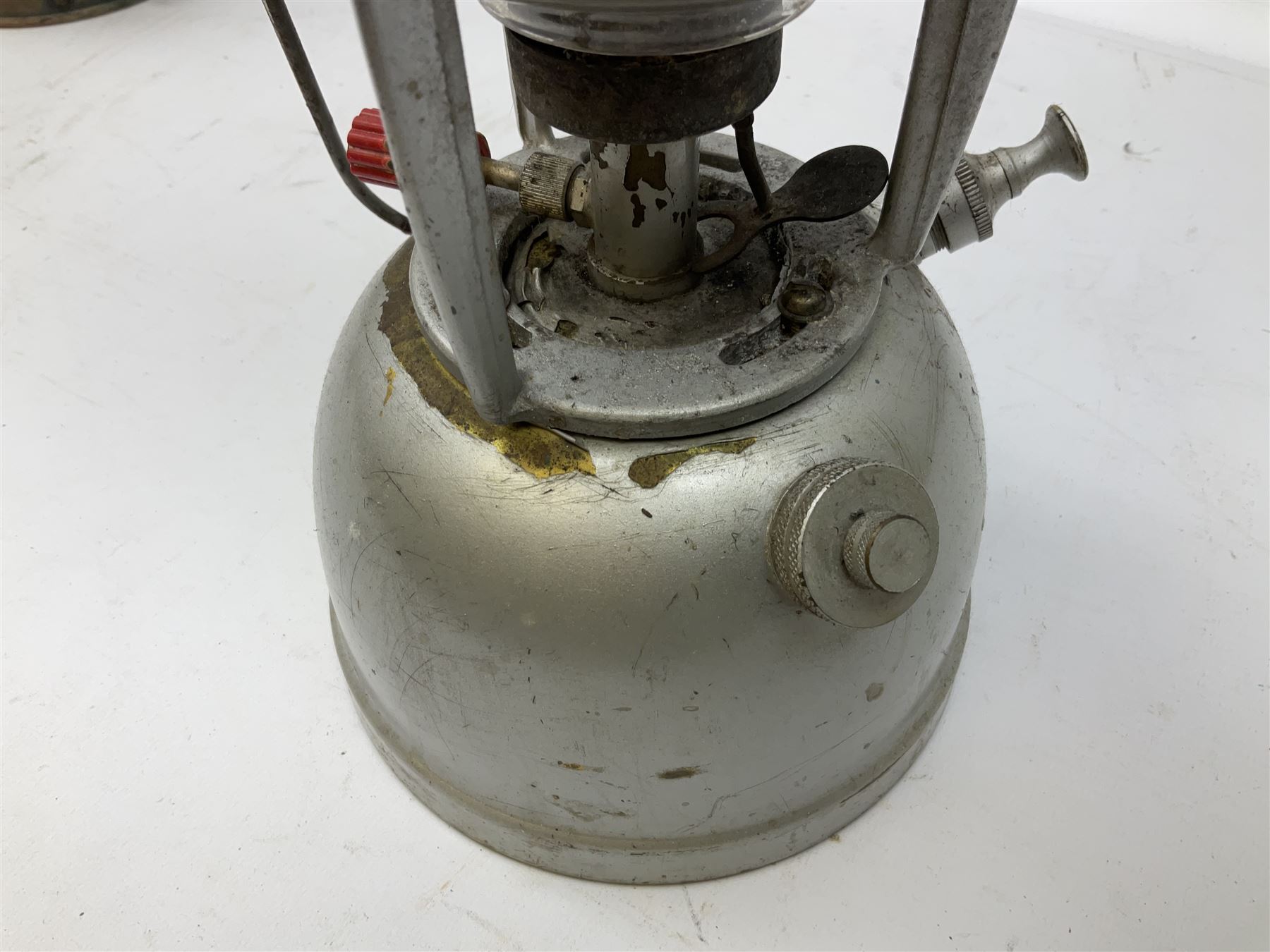 Copper and brass ship’s lamp marked ‘Anchor’, H25cm, Feuer hand storm lantern, Bialaddin Model 315 paraffin lamp and an Anchor lamp (4)