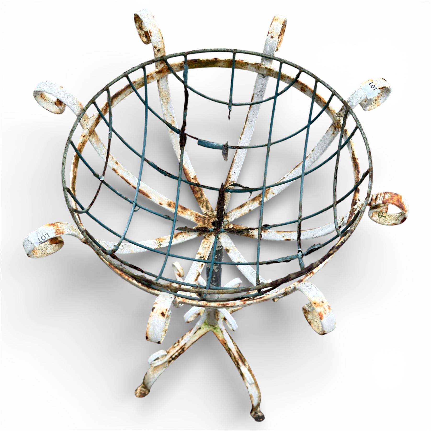 Two plant stands in a weathered white finish with wire baskets