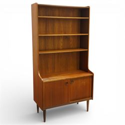 Mid 20th century Scandinavian teak bookcase cabinet in the manner of Johannes Sorth, the u...