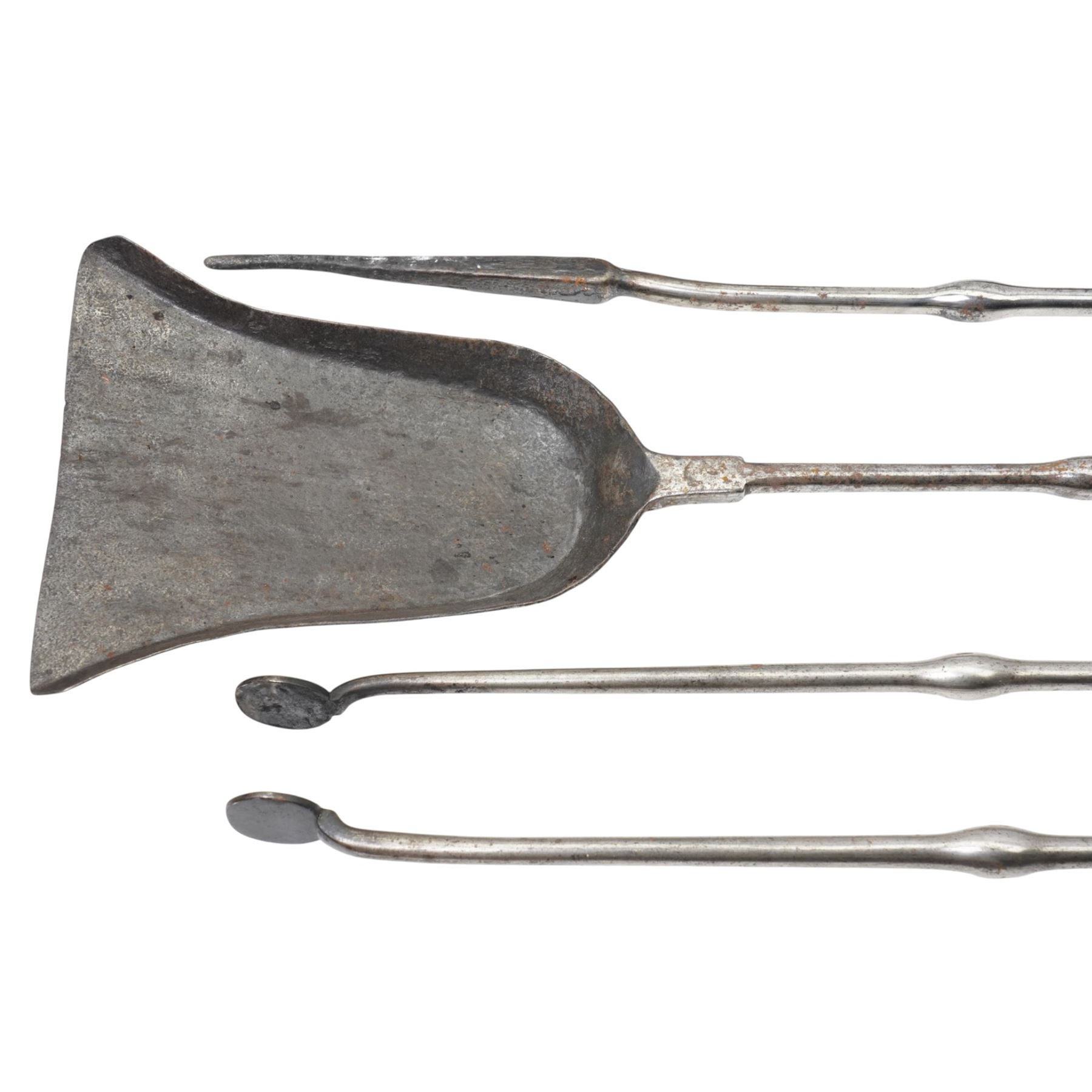 19th century fireside three piece fireside companion, H69cm; together with three further fire irons, and three bellows, one set with crest 
Provenance: Kirkham Hall
