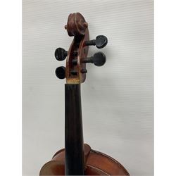 Late 19th century French three-quarter size 'Conservatory' violin with 34cm two-piece maple back and ribs and spruce top, the peg box inscribed 'Conservatory Violin Straduari', bears label 'Antonius Stradiuarius Cremonensis Faciebat Anno 1721' L55.5cm overall; in ebonised wooden 'coffin' case; and Saxony violin c1900 with 36cm two-piece maple back and ribs and spruce top; bears label 'Antonius Stradivarius Cremonensis Faciebat Anno 17**' L59cm overall; in carrying case (2)