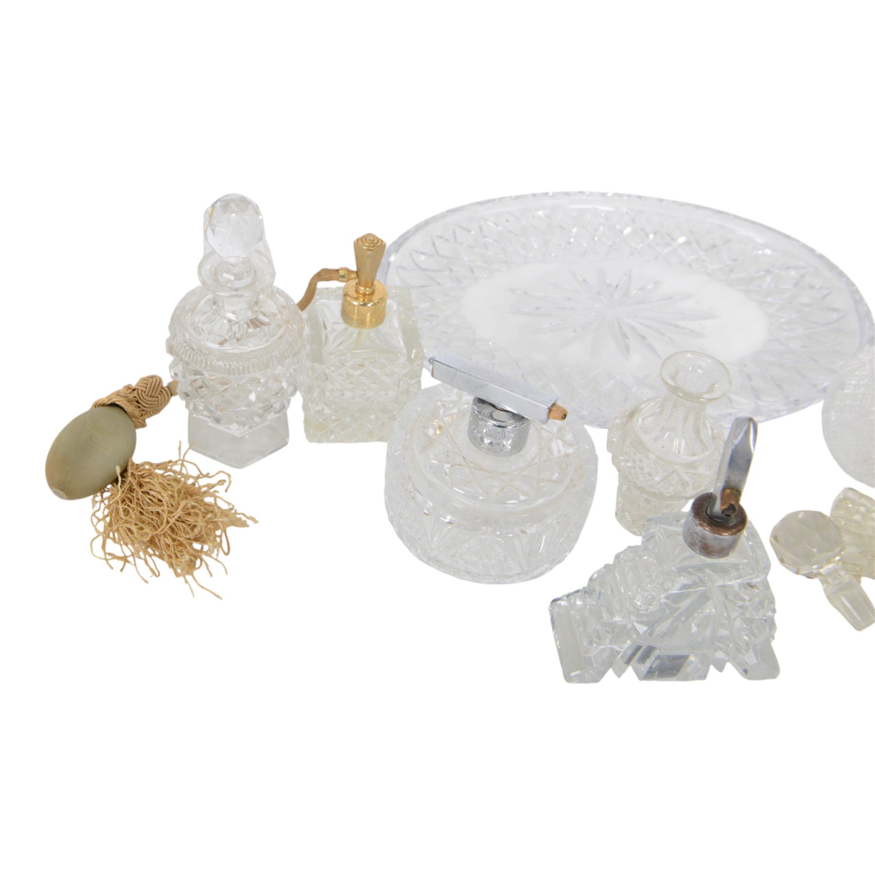 Collection of cut glass scent bottles including Art Deco examples and a cut glass tray