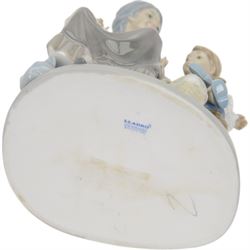 Three Lladro figures, comprising Visit With Granny no 5305, Lolita no 5192 and Classic Dance 4847