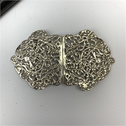 A Victorian silver belt buckle Nathan & Hayes, Chester 1899, together with five walking canes. 