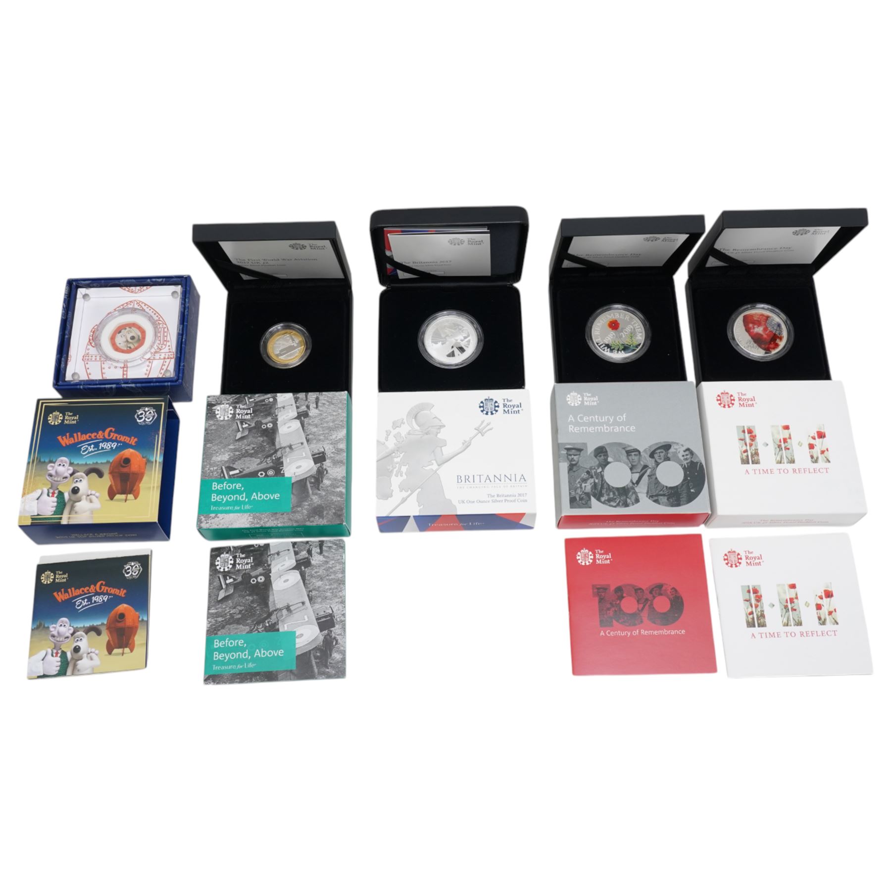 Five The Royal Mint United Kingdom silver proof coins, comprising 2017 one ounce Britannia, 2017 '100th Anniversary of the First World War' piedfort two pound, 2018 'Remembrance Day' piedfort five pound, 2019 'Remembrance Day' piedfort five pound, and 2019 'Wallace & Gromit' fifty pence