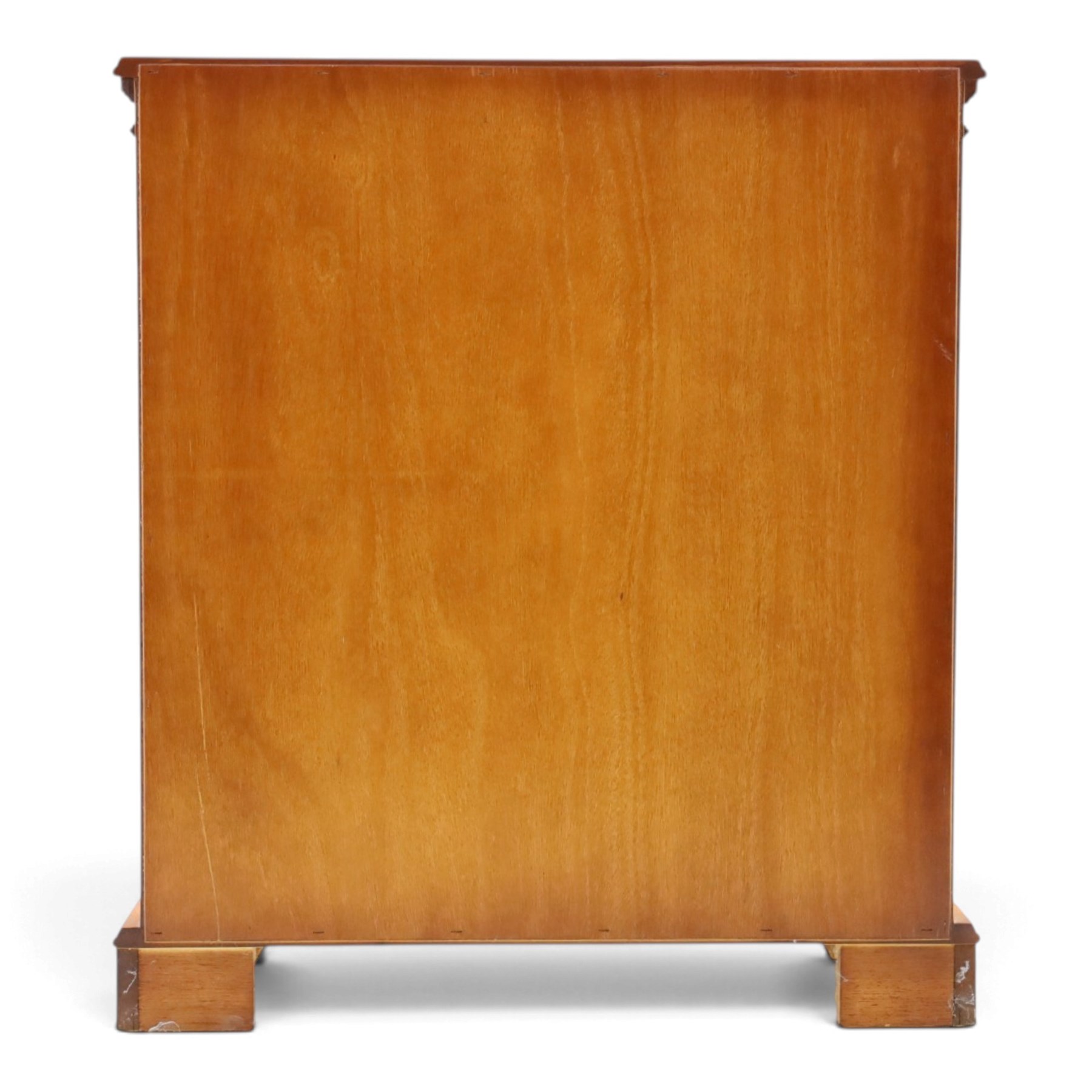 Contemporary mahogany and yew wood open bookcase, dentil cornice above two adjustable shelves, shaped apron and bracket feet 