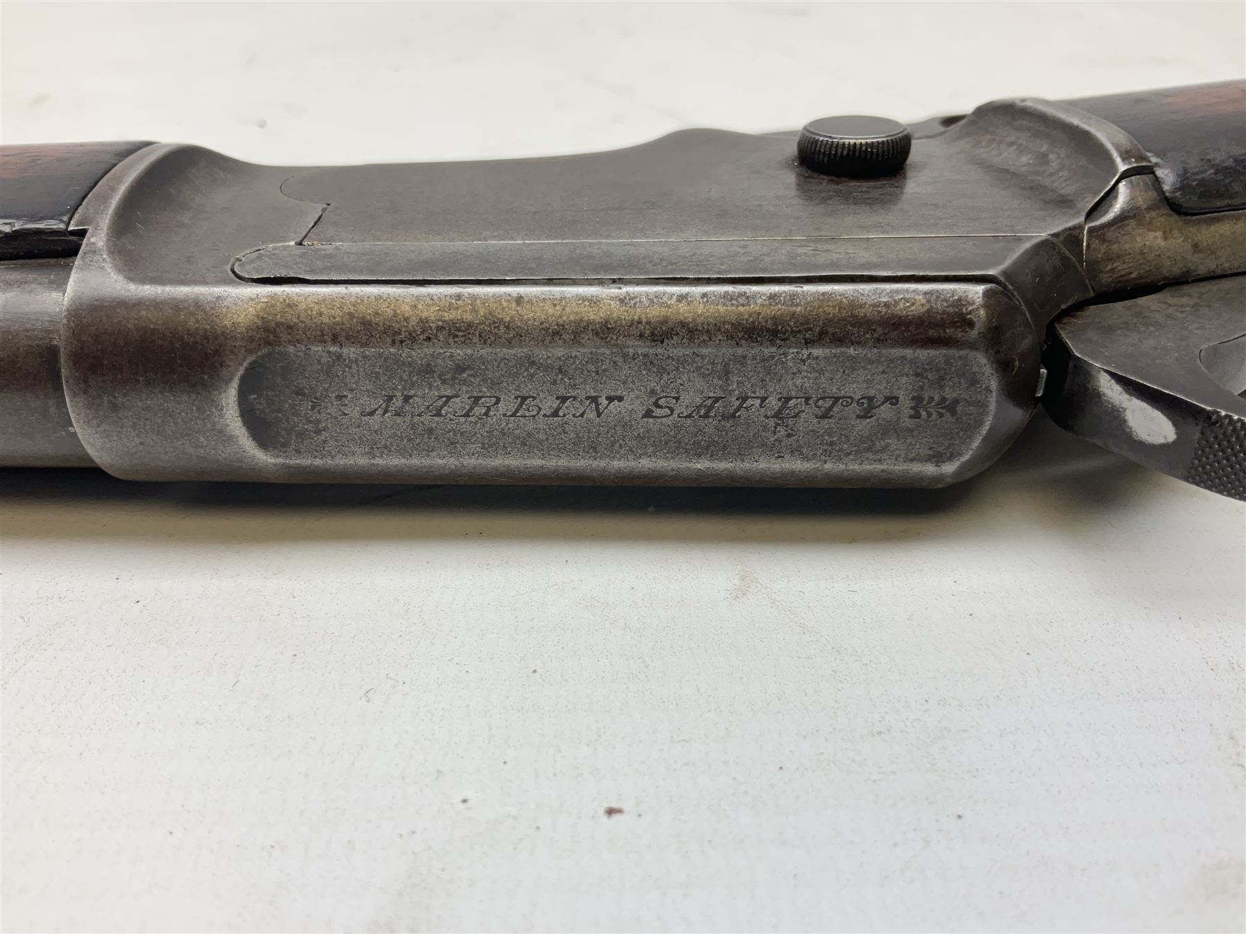 Marlin Firearms Co. USA 'Safety' .32 rim-fire rifle dated 1892, the 61cm barrel with magazine tube under, walnut stock with under lever cocking and crescent butt plate, serial no.153534, L103.5cm