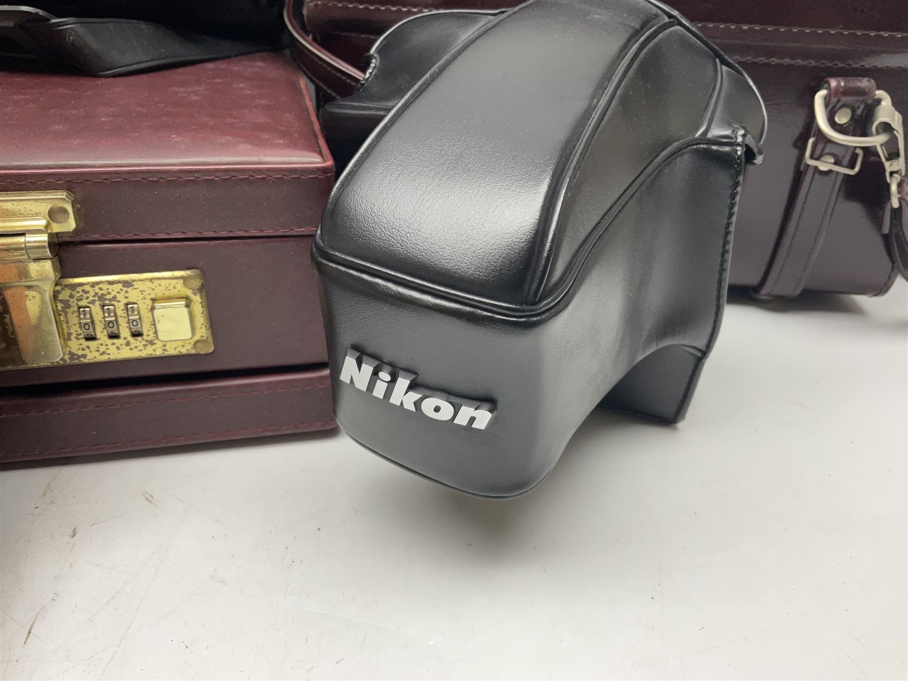 Collection of leather camera cases, to include Nikon ever ready cases and two larger cases, together with Gossen Sixticolor light meter, in box and other camera equipment 