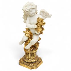 20th century clock garniture with musicians and putti, the gilt composite Italian clock with battery operated quartz mechanism, garnitures H34cm 