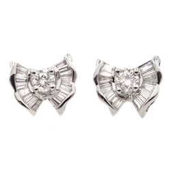 Pair of 18ct white gold round and baguette diamond bow stud earrings, hallmarked  