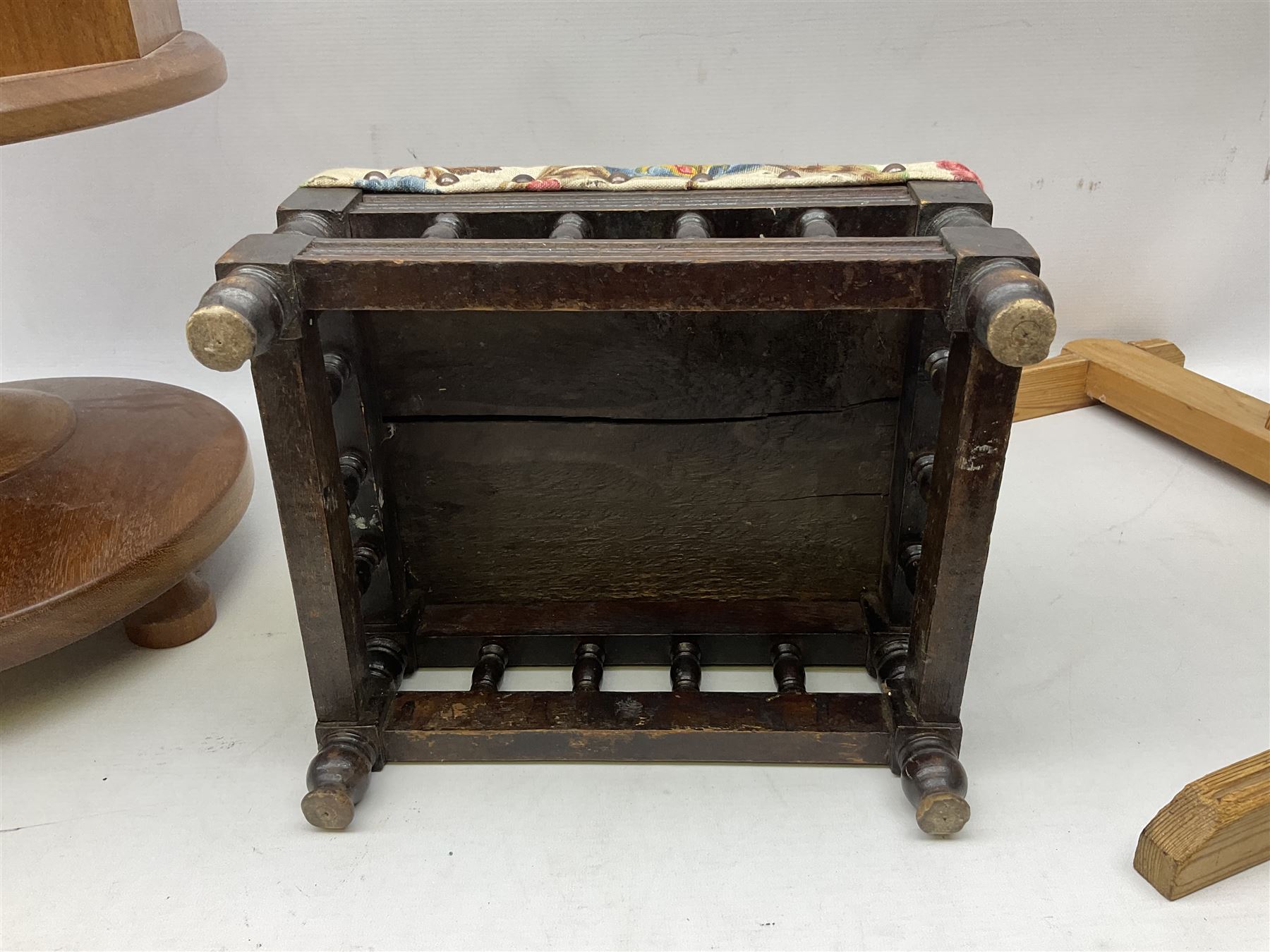 Oak sewing stool on a pedestal base with a hinged lid and compartmented