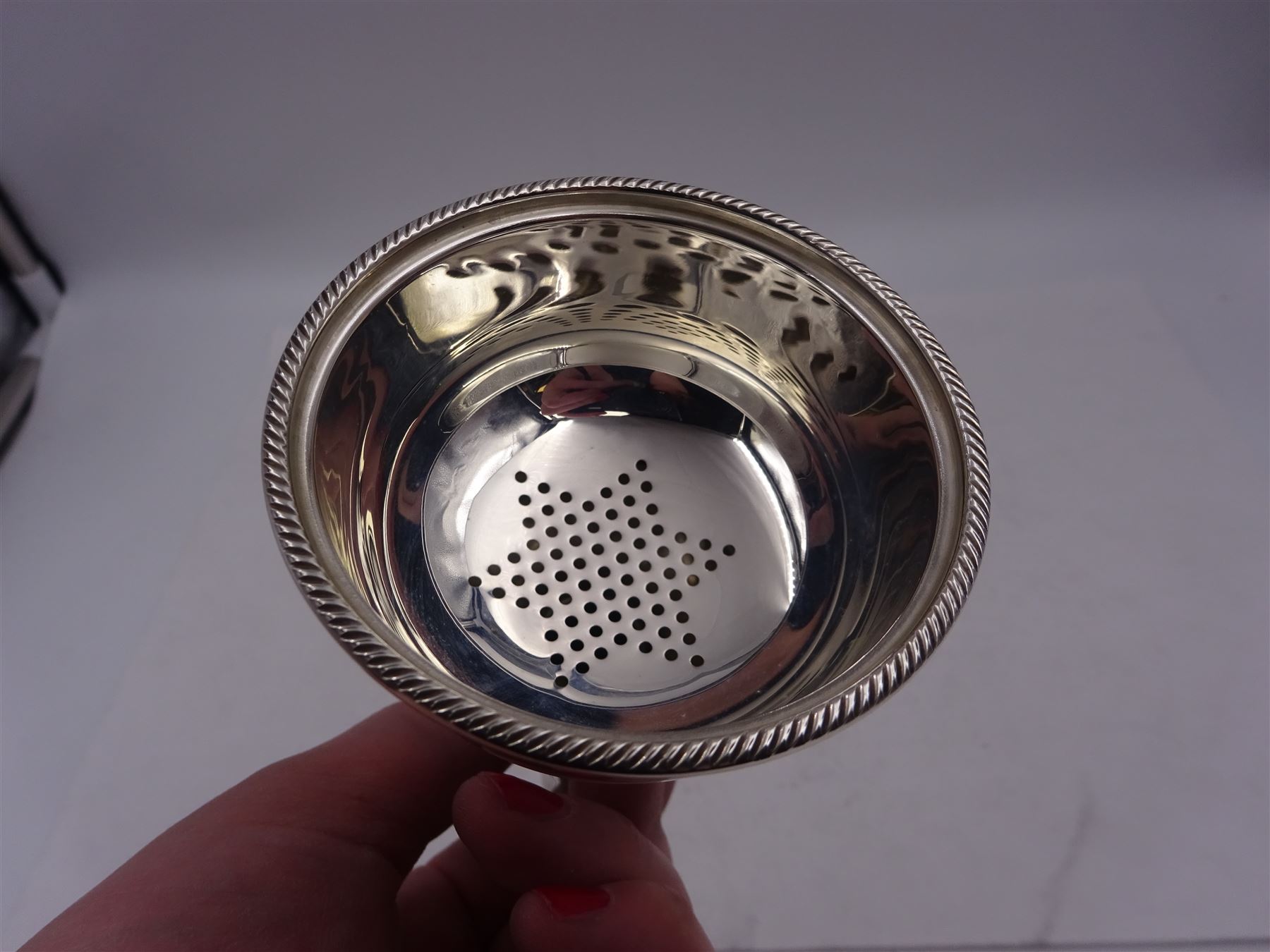 Modern silver wine funnel, of typical form, with oblique gadrooned rim, and shell decoration, hallmarked Laurence R Watson & Co, Birmingham 1989