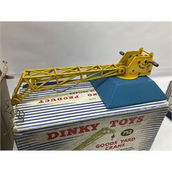 Dinky - Supertoys No.972 20-ton Lorry Mounted Coles Crane; No.752 Goods Yard Crane; both boxed; and quantity of unboxed and playworn die-cast models including motor cars, commercial and emergency vehicles, farm and agricultural vehicles, racing cars etc; and a collection of Dinky catalogues