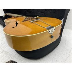 1950s acoustic guitar with f-holes and pickguard L105cm; black fur lined hard carrying case