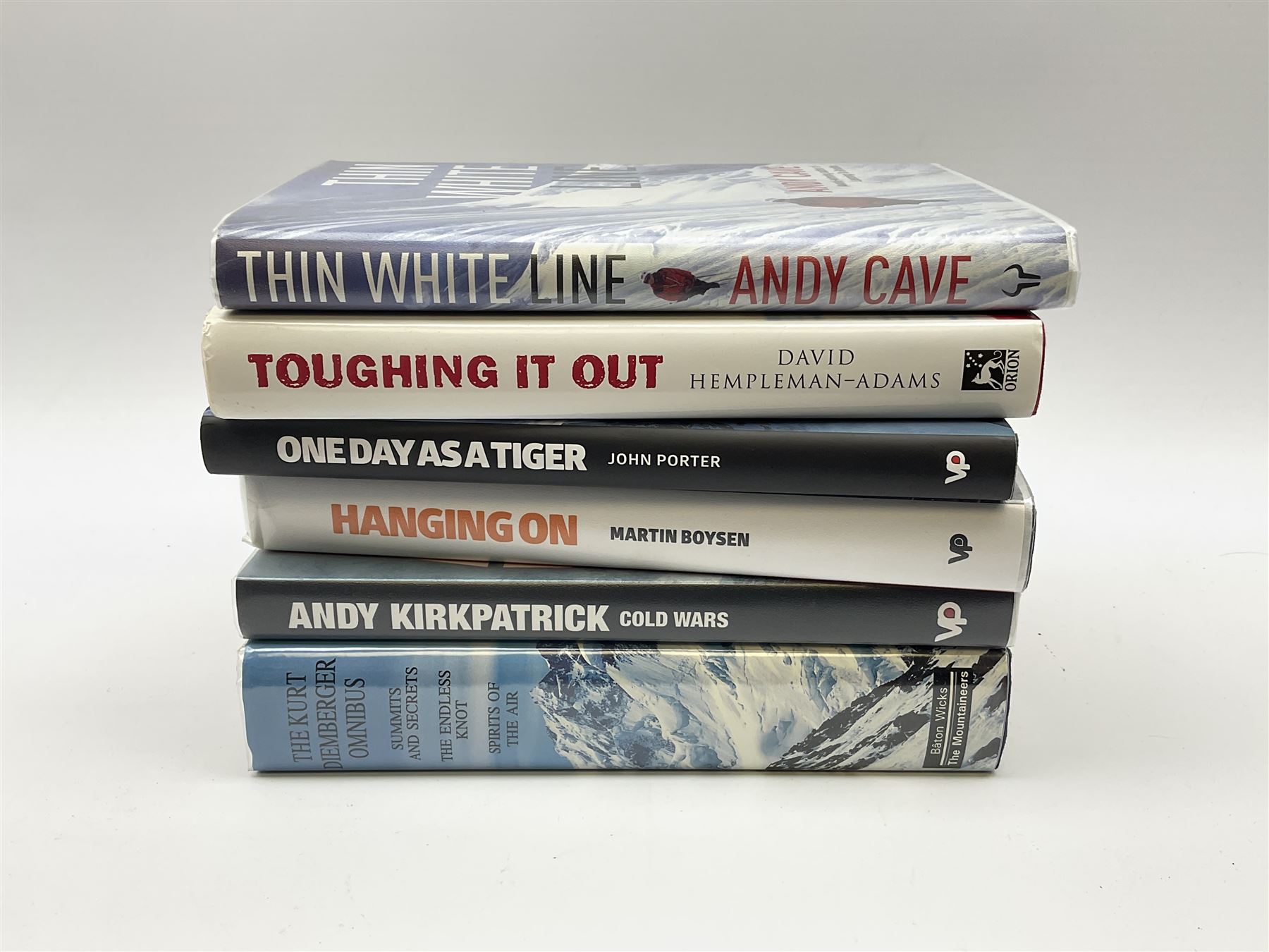 Mostly signed book relating to climbing or mountaineering including 'Hanging On' by Martin Boysen, 'One Day As A Tiger' by John Porter, 'Toughing It Out' by David Hempleman-Adams, 'The White Line' by Andy Cave etc (6)