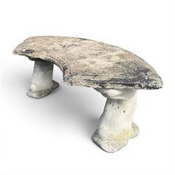 Weathered cast stone three-piece curved bench, raised on naturalist tree-stump style end supports