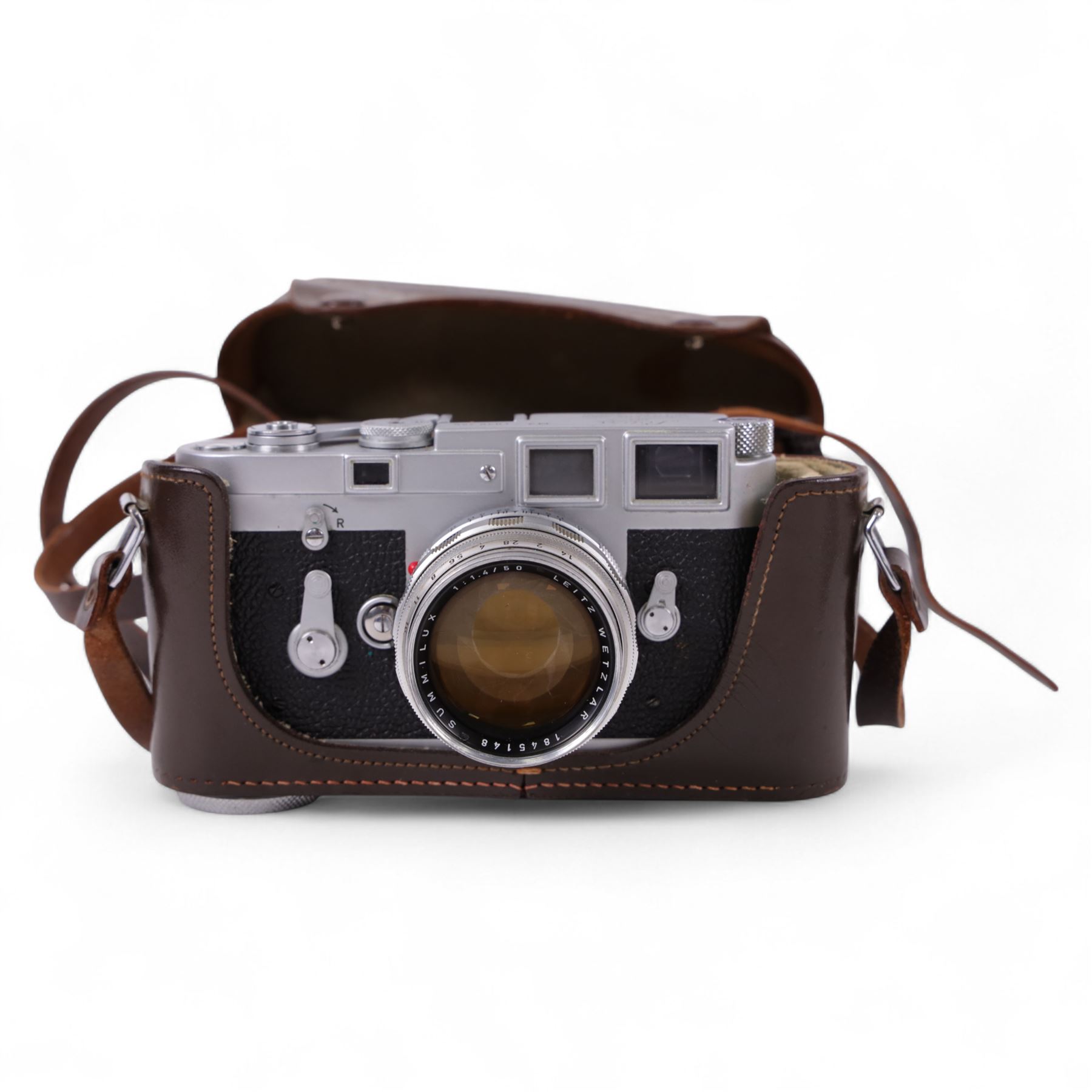 Leica DBP M3 35mm rangefinder camera body, serial no. 1038356, circa 1961, in chrome finish, housed in brown leather Leica case, with a Leitz Wetzlar Sunnilux 1:1.4/50 lens serial no. 1845148, Leitz Wetzlar Elmar 1:4/135 lens serial no. 1825980, 12575N hood, 12521G hood, Leica Meter MC serial no. 99015, Sunpak Auto28 SR Thyristor, Linhof 3 Way Pan tripod, and a Toshiba PE-1 Linear Exposure meter, all housed in an Original Benser Everready Case, most items with instruction booklets 