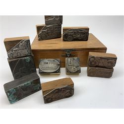 A group of eleven printing blocks, probably early 20th century, detailed with various automobiles and bikes, in unassociated box.   